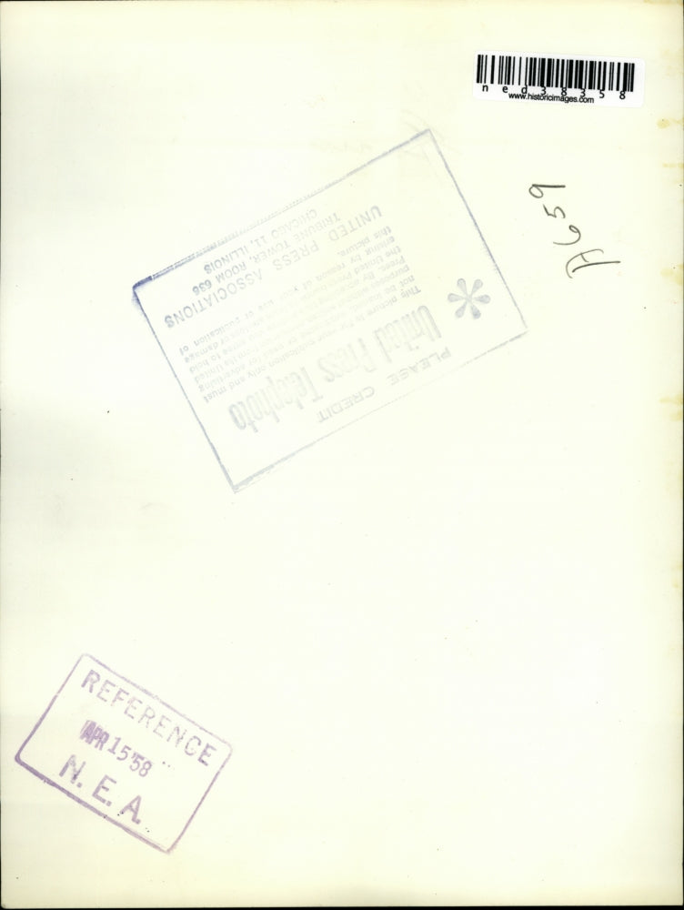 1958 Press Photo Jim Costello stands in a pan in the phonebooth