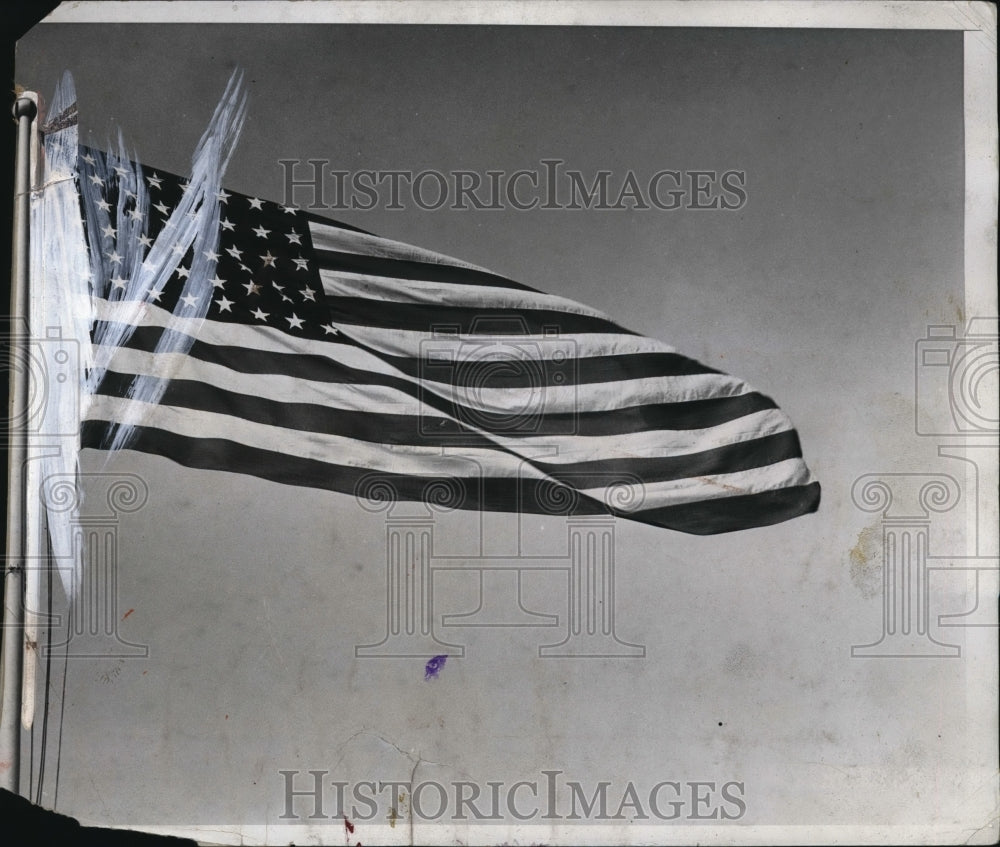 1933 Press Photo The Stars and Stripes Forever unfurling in the wind USS Pensaco
