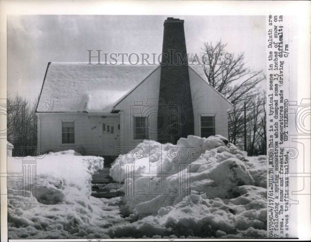 1961 Press Photo This is a typical scene in the Duluth are following snowstorm