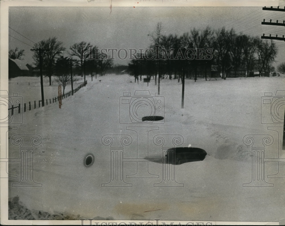 1936 Press Photo Two autos covered by snow on state highway