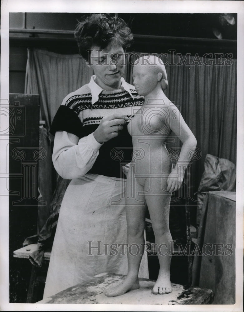 Load image into Gallery viewer, 1951 Press Photo Lorna Goatcher making final touches on her stone carving.
