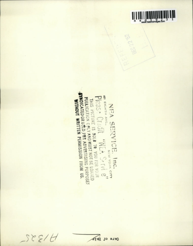 1952 Press Photo Woman Taking Care Of Her Hair