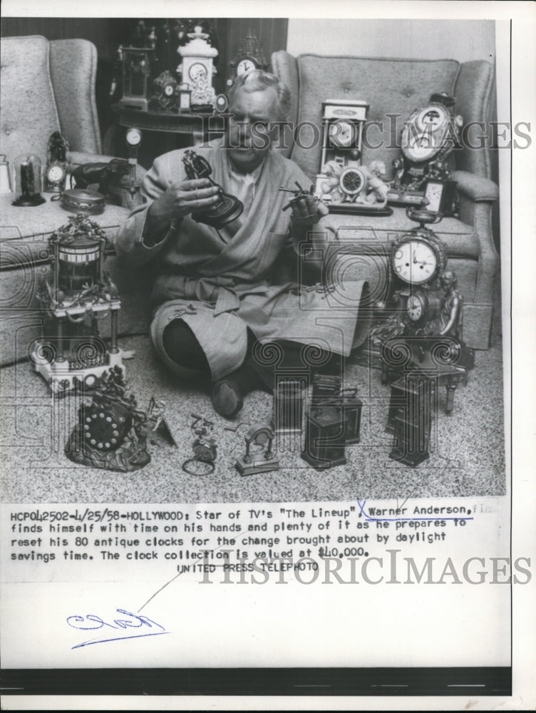 1958 Press Photo Warner Anderson Resets His 80 Antique Clocks