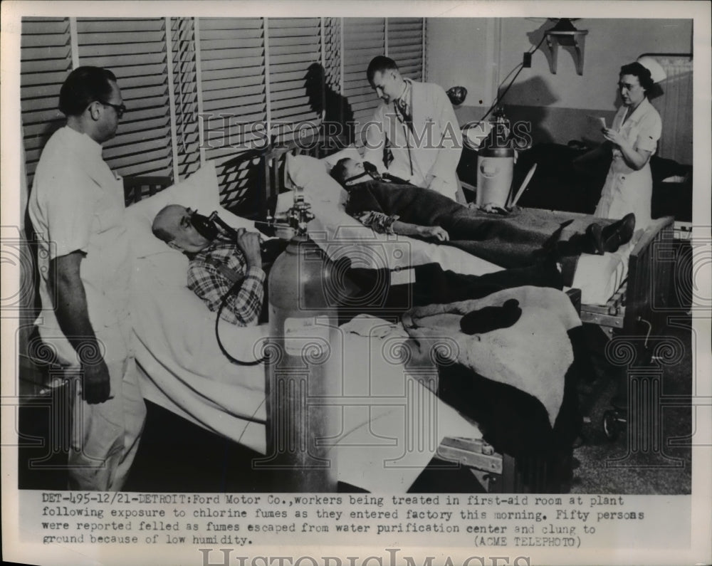 1951 Press Photo Workers at Ford Motor Co., being treated in first aid room