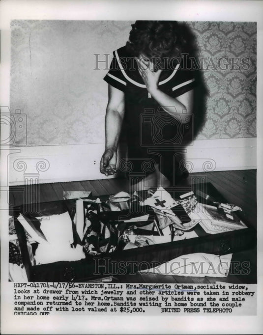 1956 Press Photo Evanston Ill Mrs Marguerite Otman socialite widow looks at