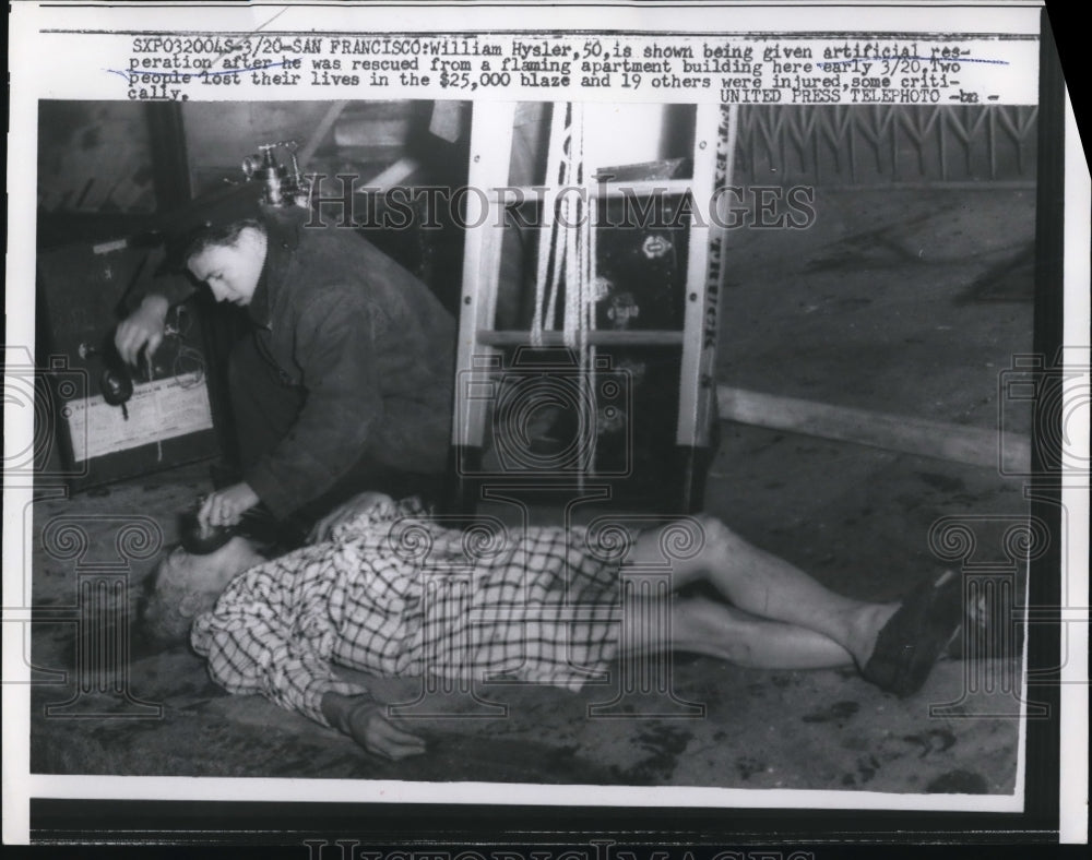 1957 Press Photo William Hysler being given artificial resperation