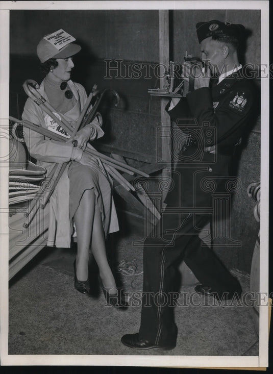1936 Press Photo Lorine Curry pauses in her duties of selling Legion canes to