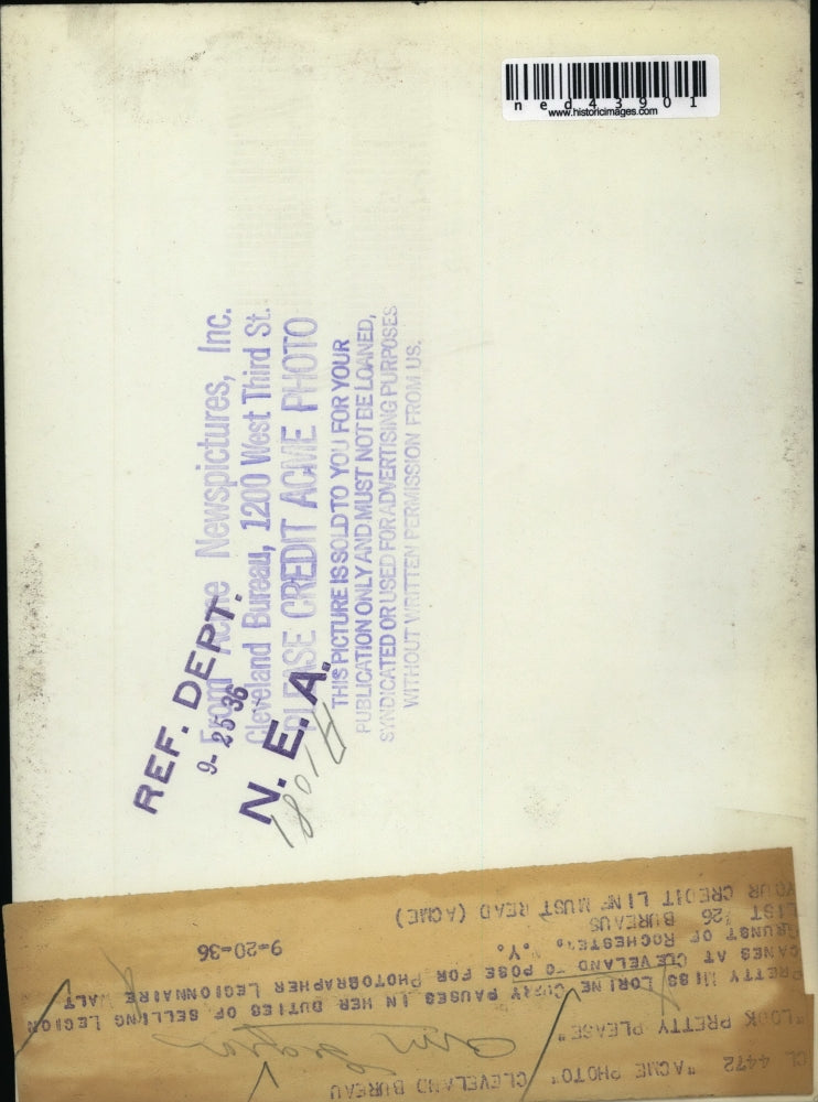 1936 Press Photo Lorine Curry pauses in her duties of selling Legion canes to