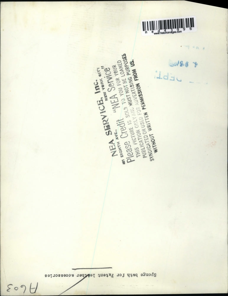 1951 Press Photo A model showing sponge bath for leather items