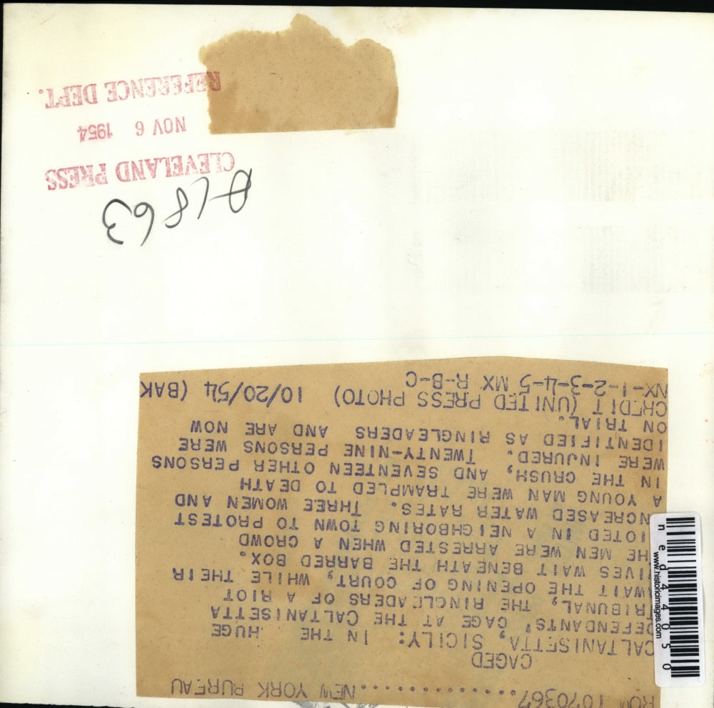 1954 Press Photo Sicily Men in cage were arrested when a crowd rioted to protest