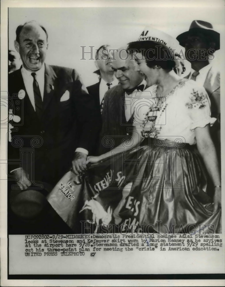 Load image into Gallery viewer, 1956 Press Photo Democratic Presidential nominee Adlai Stevenson looks at
