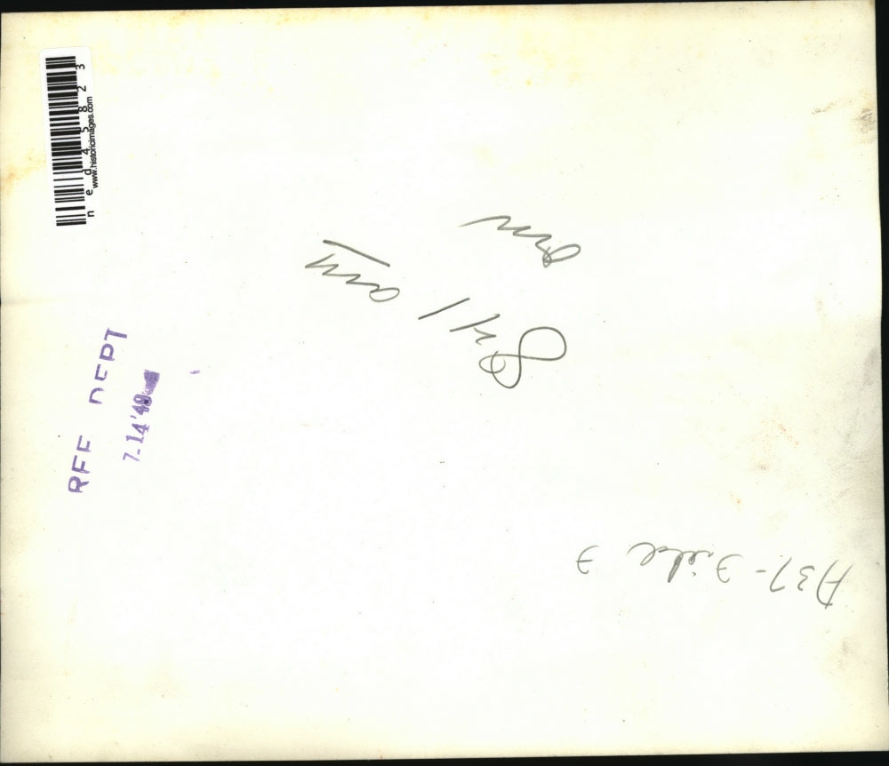 1949 Press Photo Firemen are shown testing a new fire resisting gas tank for