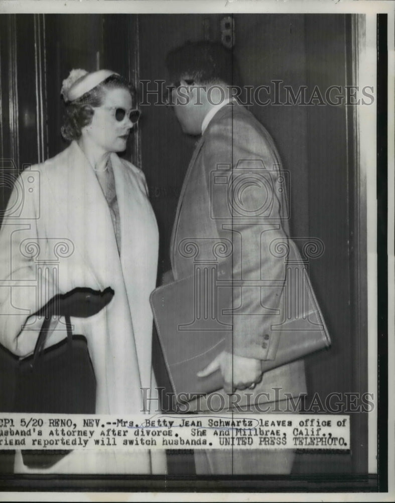 Load image into Gallery viewer, 1957 Press Photo Mrs. Betty Jean Schwartz leaves office of husband lawyer
