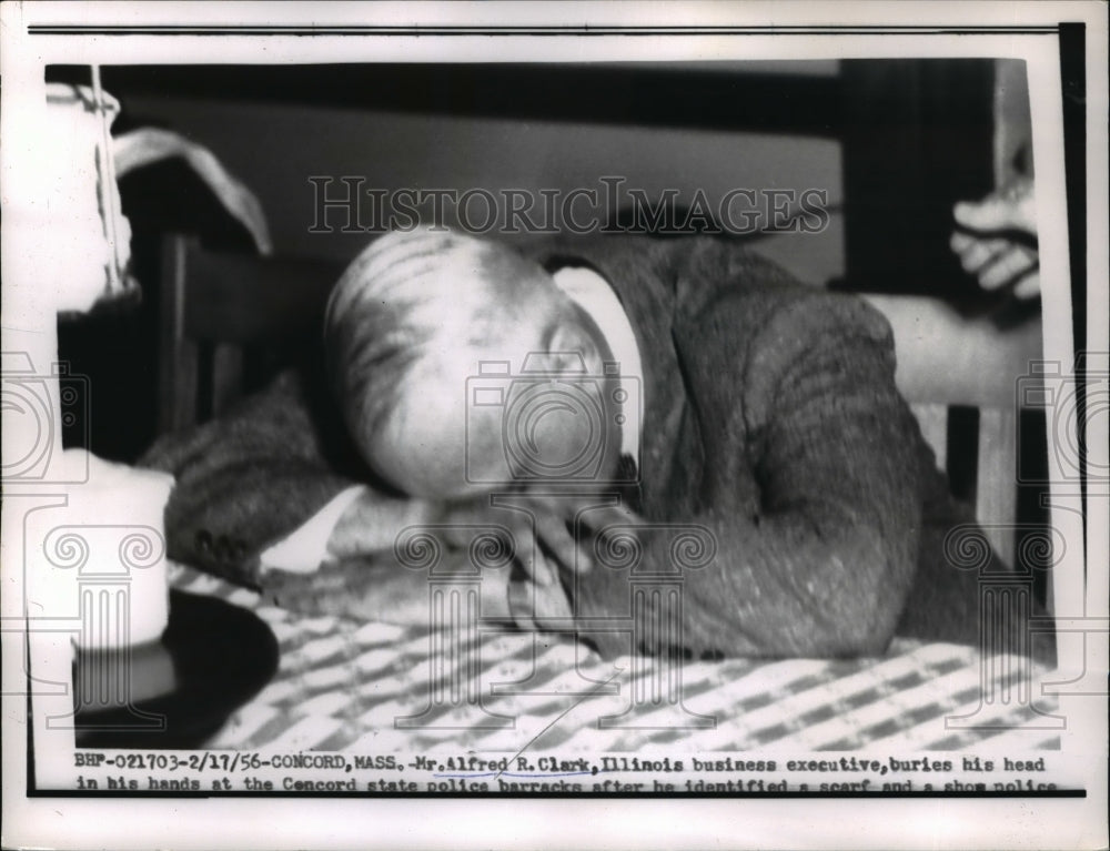 1956 Press Photo Illinois Businessman Alfred R. Clark Buries Head During Trial