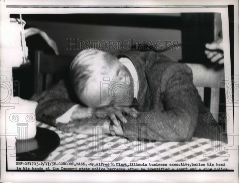 Load image into Gallery viewer, 1956 Press Photo Illinois Businessman Alfred R. Clark Buries Head During Trial
