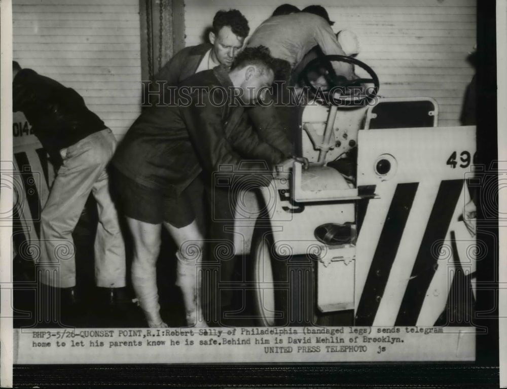 1954 Press Photo Robert Sally of Philadelphia sending a telegram to his parents.