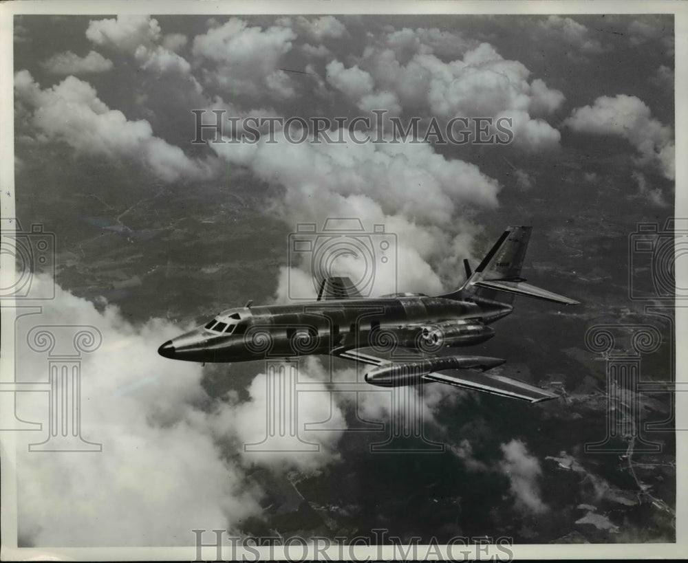 1960 Press Photo C-140 cruising through Georgia clouds- Historic Images