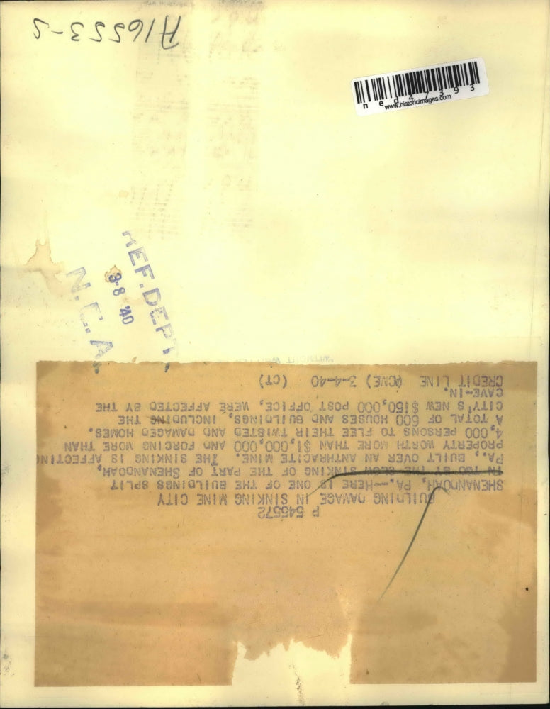 1940 Press Photo Building Split in Two by Sinking Mine