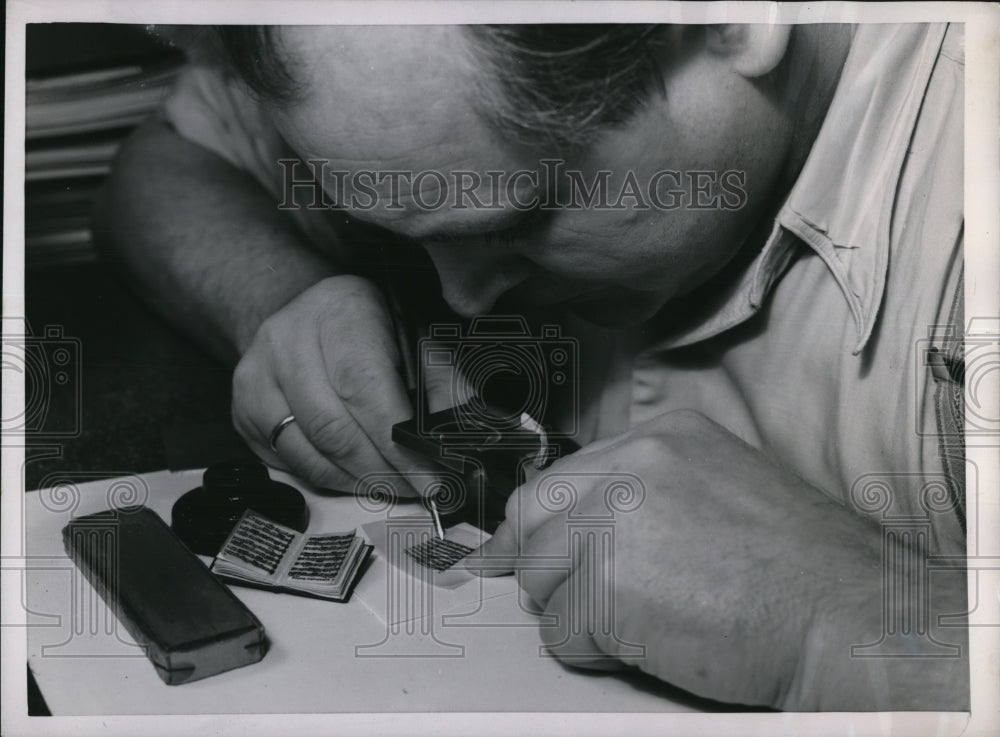 1952 Press Photo Composer Fritz Krage works on miniature music album