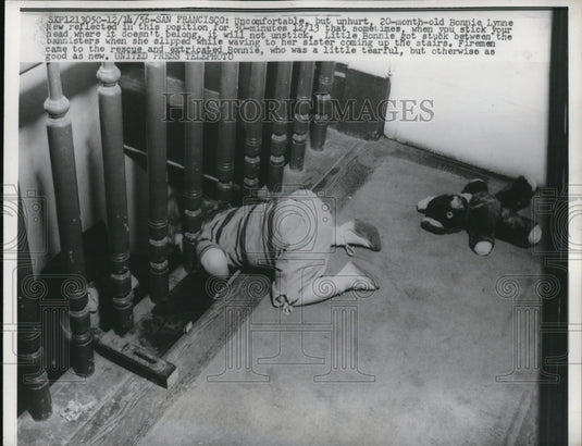 1956 Press Photo Bonnie Lynne stuck between the bannisters when she slipped