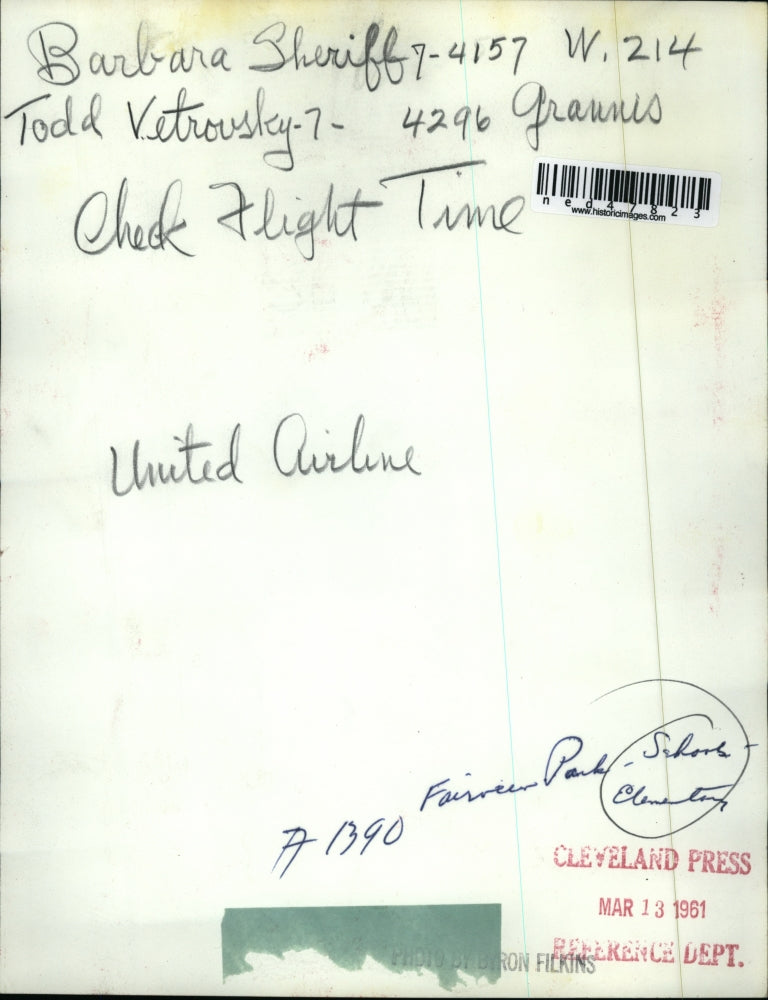 1961 Press Photo Barbra Sheriff and Todd Vetrosky check flight times.