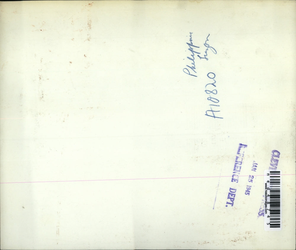 1945 Press Photo para frag bombs attached to parachutes drift down on Clark