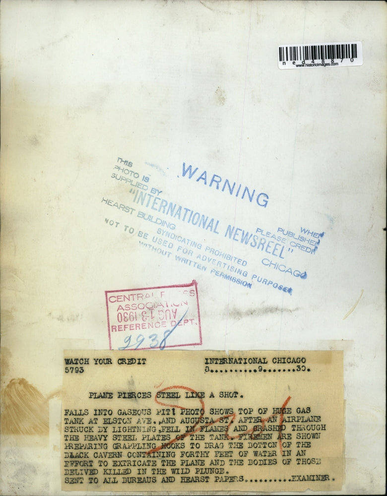 1930 Press Photo Firemen Repair Hole Huge Steel Gas Tank Caused by Plane Crash