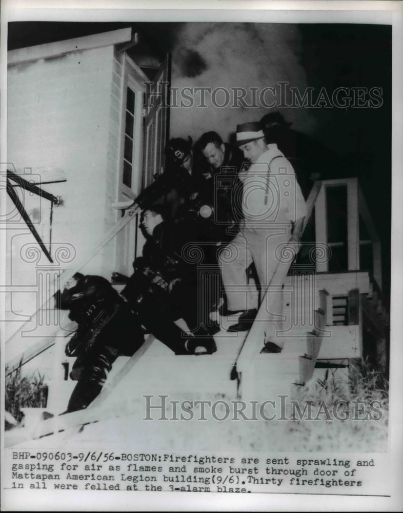 Load image into Gallery viewer, 1956 Press Photo Firefighters as flames &amp; smoke burst American Legion building
