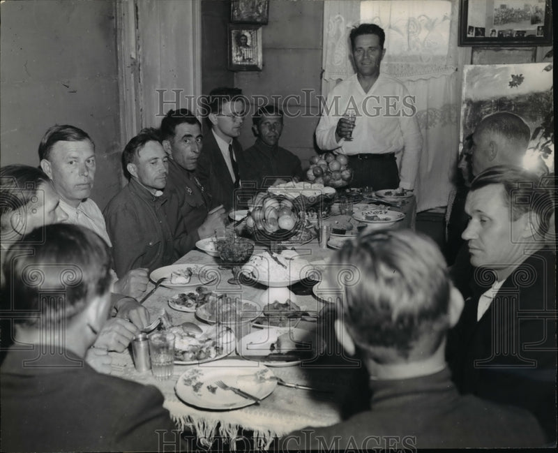 Load image into Gallery viewer, 1948 Press Photo A Toast to Bring The Normal Life
