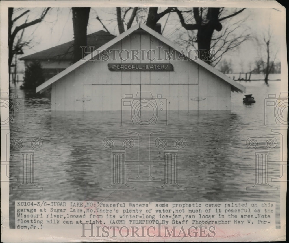 1949 Press Photo Peaceful water sign painted at Sugar Lake where there is flood