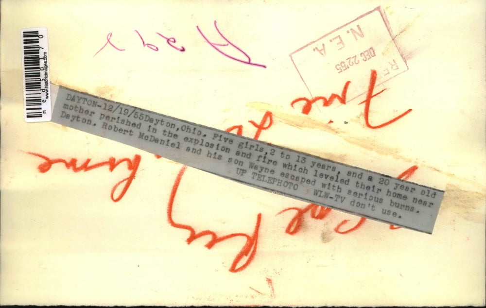 1955 Press Photo Robert McDaniel and his son, Wayne escaped fire and explosion