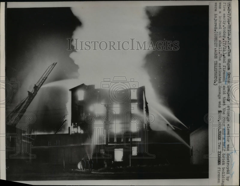 Load image into Gallery viewer, 1951 Press Photo Odge Grain Company storage elevator was destroyed by fire
