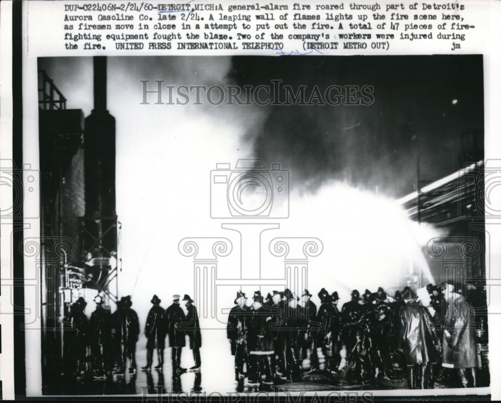 1960 Press Photo Detroit Mich firemen battle blaze at Aurora Gas Co