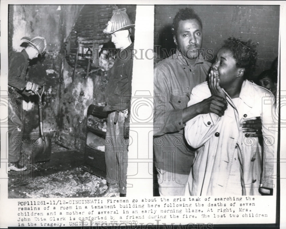 1956 Press Photo Cinncinati Ohio firemen search for bodies of kids after a fire