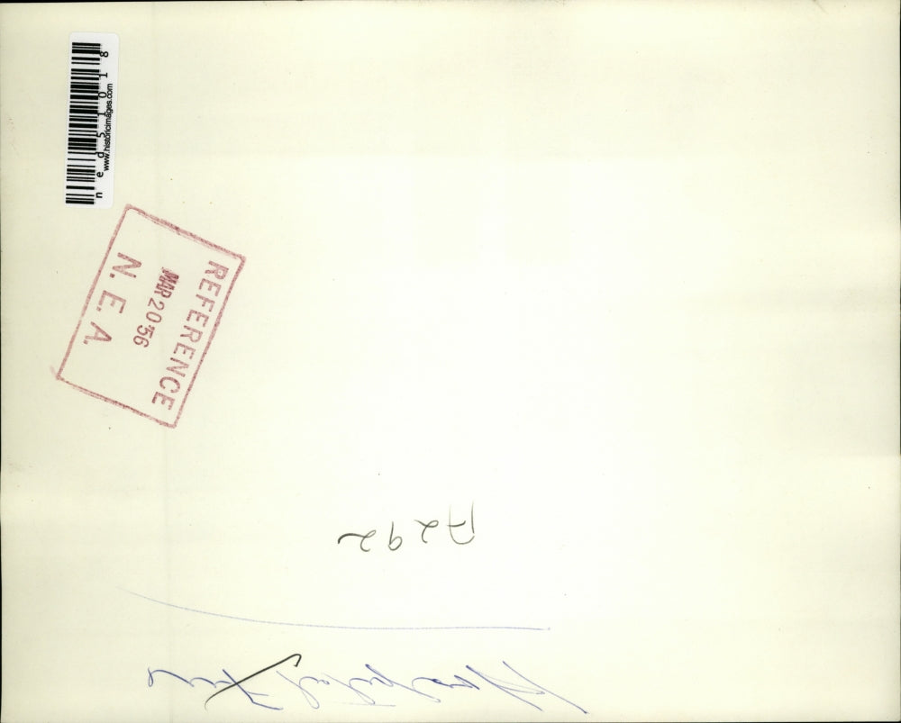 1956 Press Photo Fireman aided by student fighting fire MO State Mental Hospital