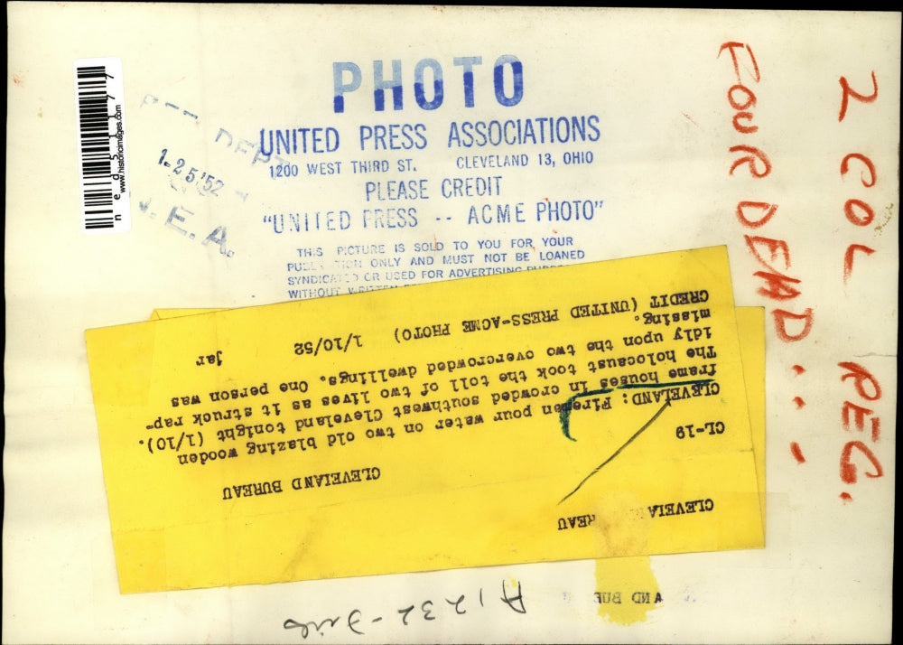 1952 Press Photo Cleveland Ohio firemen battle blaze at frame house