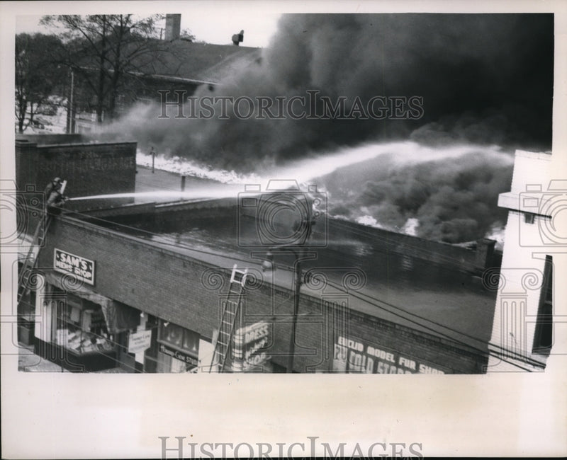 Load image into Gallery viewer, 1951 Press Photo E 105th St store fronts burned in Cleveland Ohio
