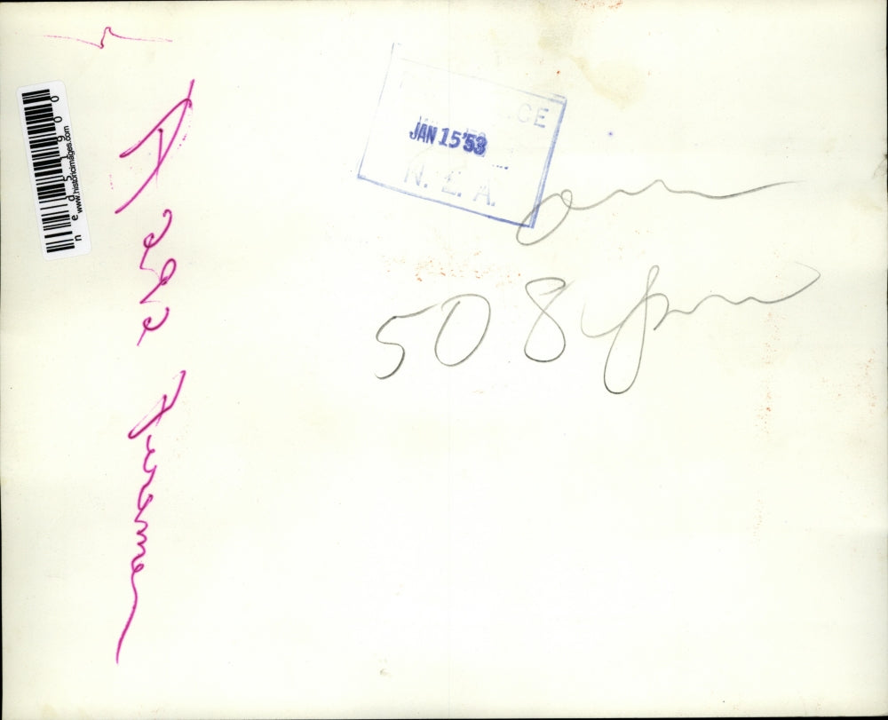 1953 Press Photo Joseph Kildruff carrying Mrs. Eliza MacDonald over hose lines