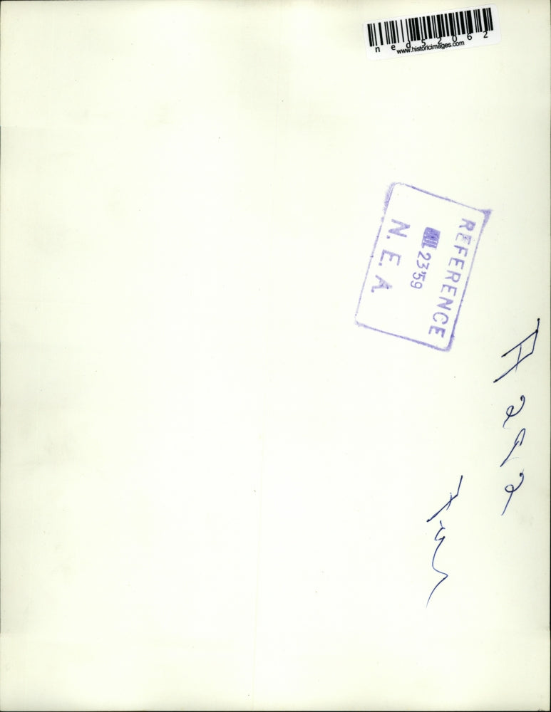 1959 Press Photo Fireman as he Carries the Bassinet