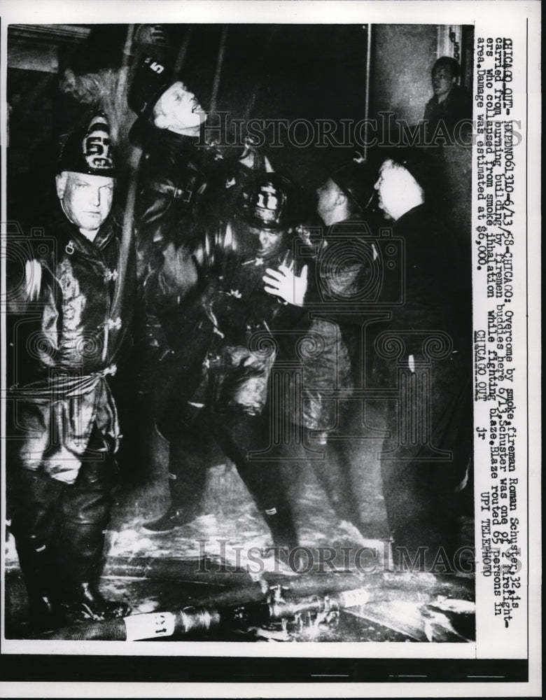 1958 Press Photo Firefighters Collapsed from Smoke Inhalation