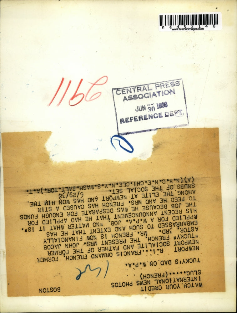 1938 Press Photo Francis Ormand French holding a dog while reading a book