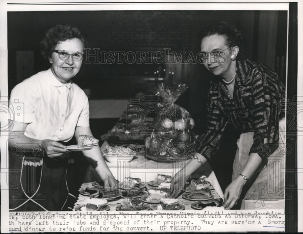 1957 Press Photo Mother and Daughter serves Smorgasbord Dinner to raise dunds