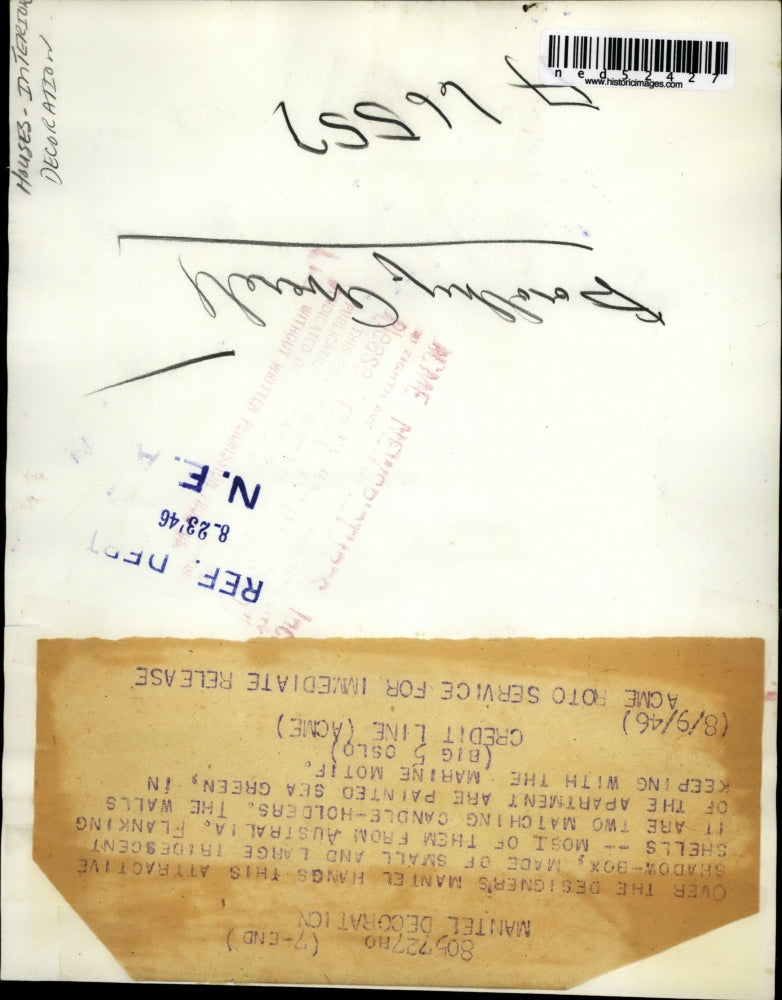 1946 Press Photo Shadow box made of iridescent shells on a mantel