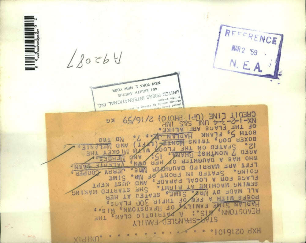 1959 Press Photo The Herlan Sime family with the 300 flags