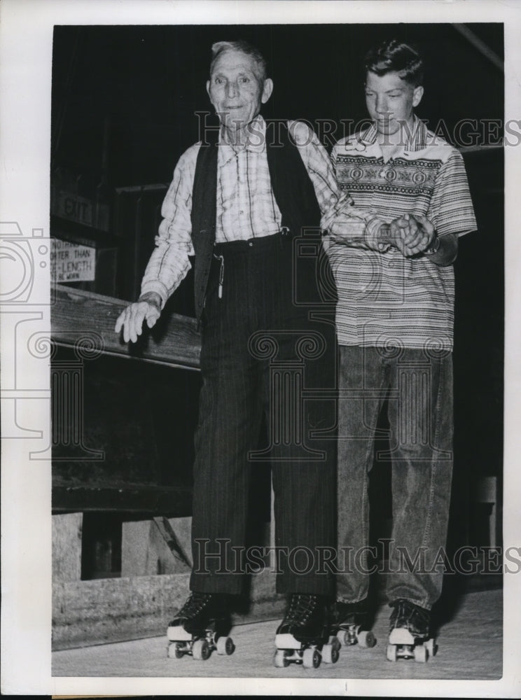 1957 Press Photo James Sweet Learning To Roller Skate For 88th Birthday- Historic Images