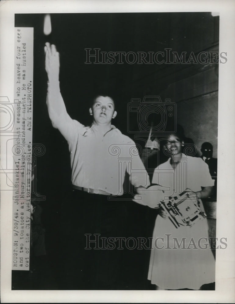 1948 Press Photo John Staskiel as he was hustled out of the City Auditorium