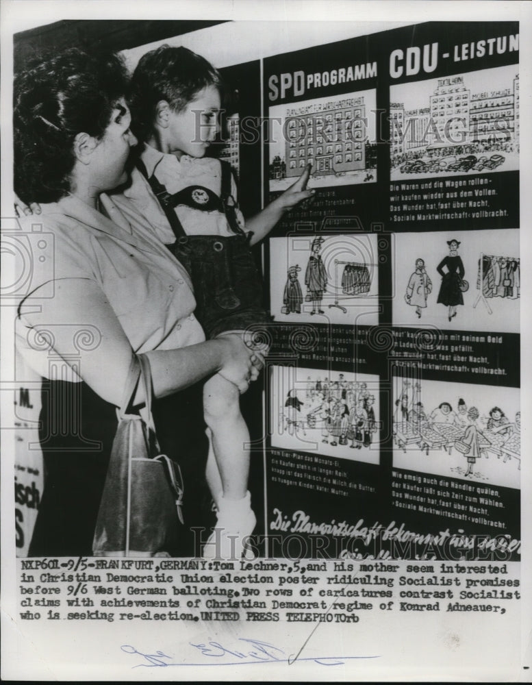 1953 Press Photo Mother & Son's Interest in Election Poster