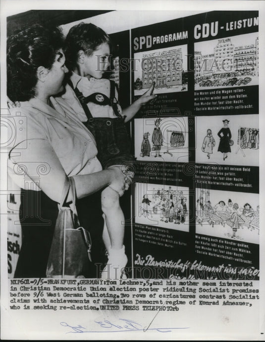 1953 Press Photo Mother & Son's Interest in Election Poster