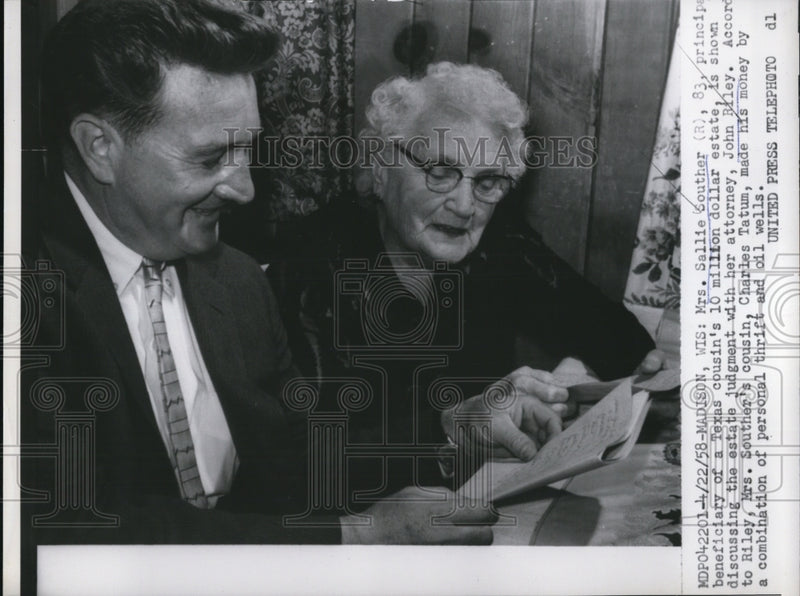 Load image into Gallery viewer, 1958 Press Photo Mrs. Sallie Souther with her attorney John Riley
