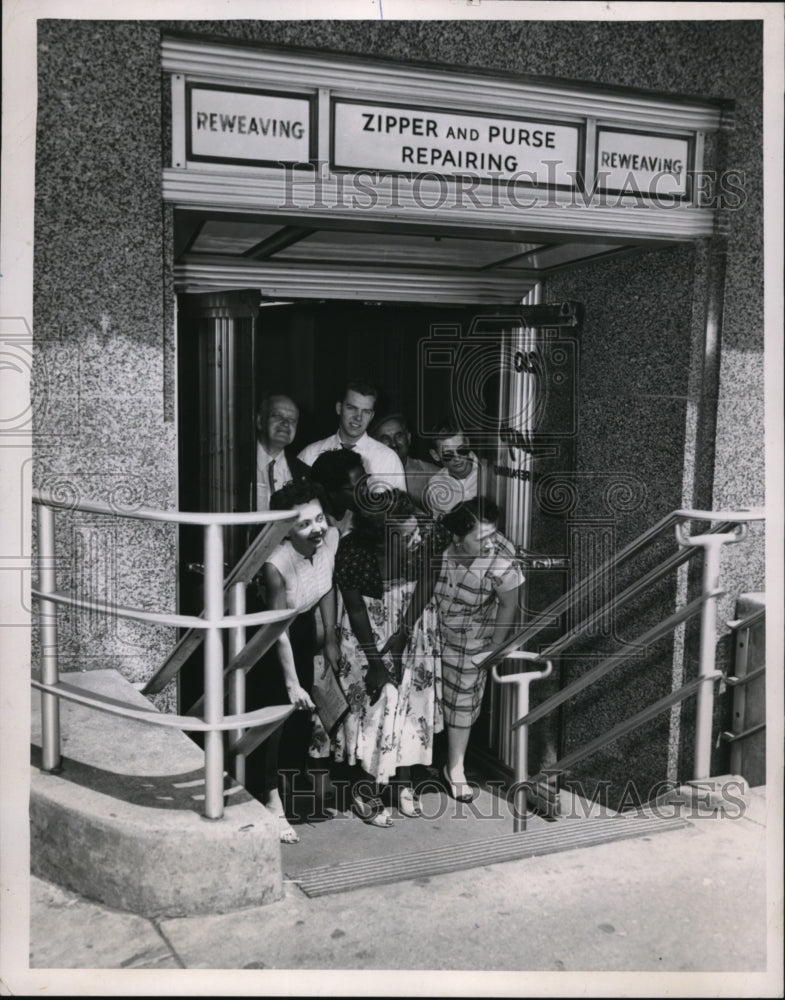 1954 Press Photo Waiting at the doorway